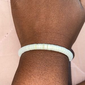 yellow and white bracelet